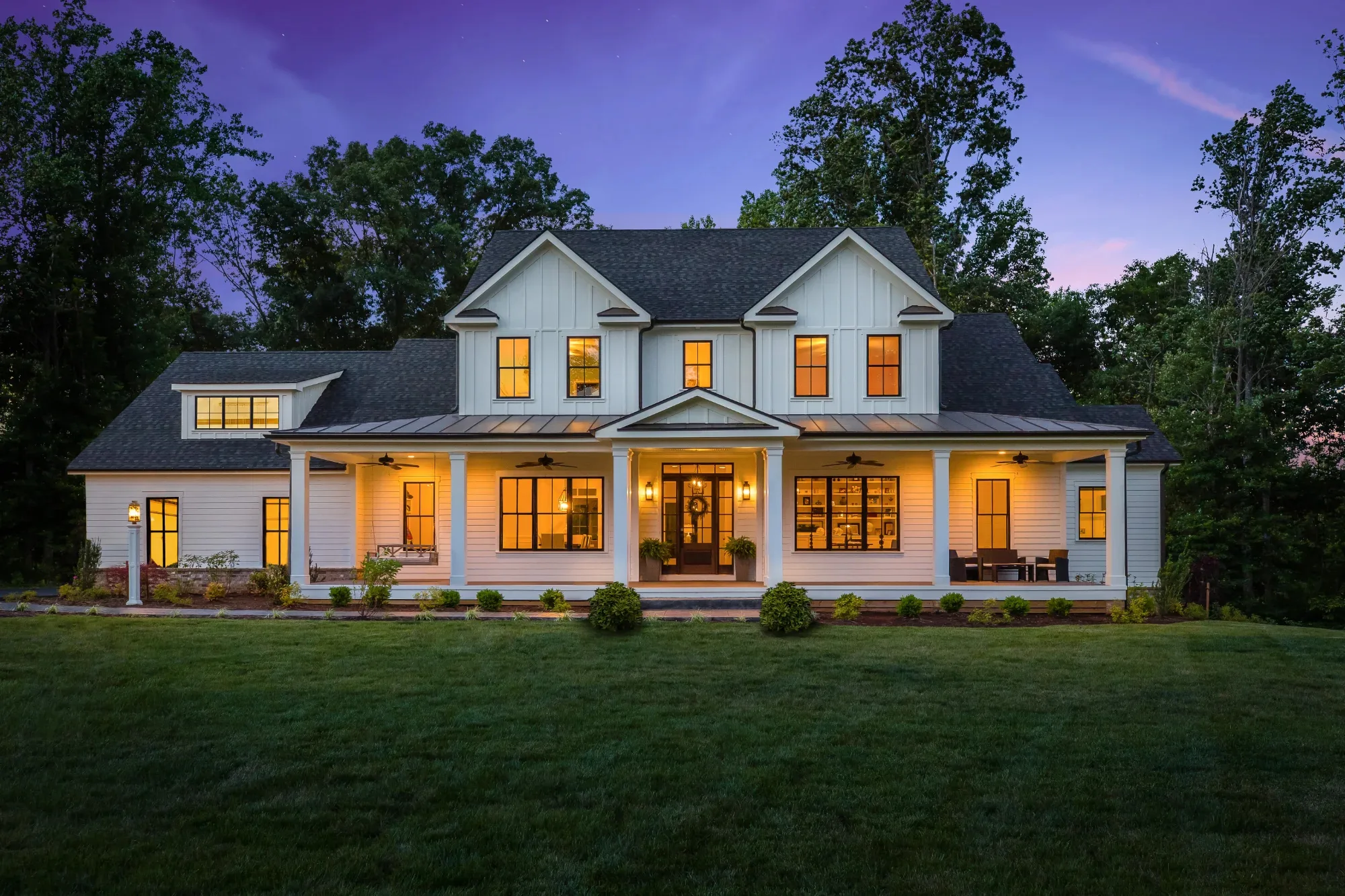 The Milton Farmhouse — modern farmhouse with wraparound porch designed by Daniel Allen Designs in Milton, Georgia